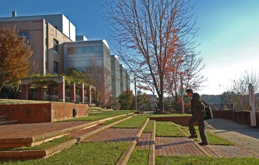 Student Walking Up States At NC State Centennial Campus - SW Raleigh NC